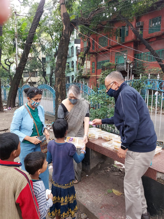 NVRDC volunteers distributing relief to children